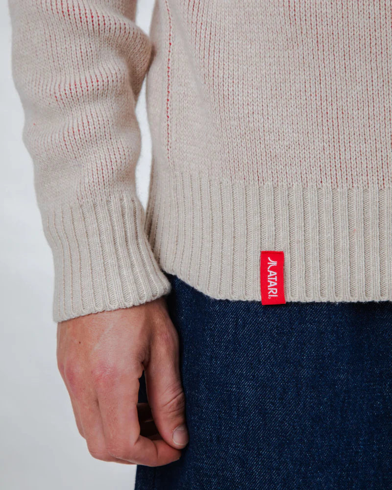 Pull Atari Jacquard – L’icône geek en maille rouge
